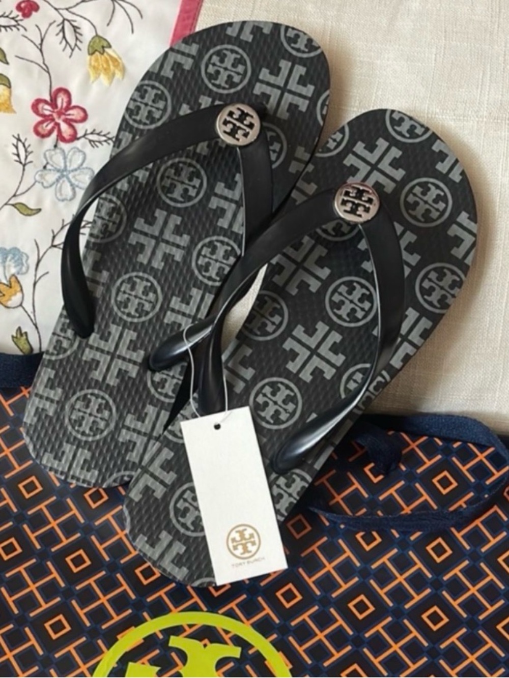 Tory Burch Black Logo Print Flip Flops with Gold Emblems